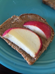 My daily breakfast: Ezekiel bread + almond butter + apple slices